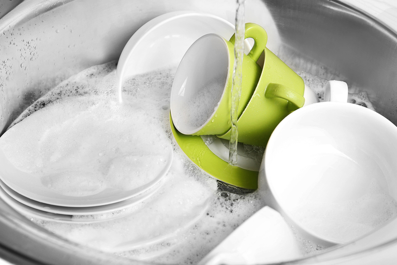 Greener Dishwashing: Is Handwashing Better Than Using the Dishwasher? | Africa Studio/Shutterstock