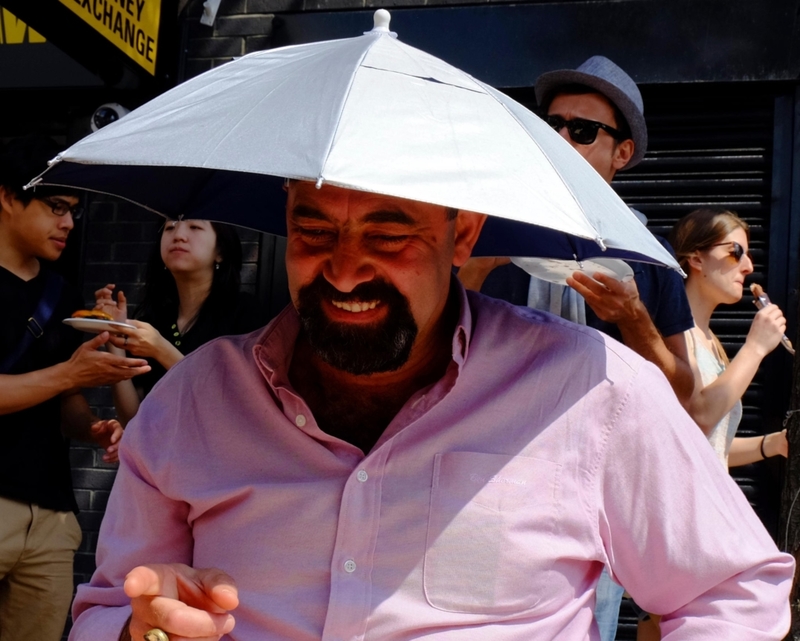 Umbrella Hat | Alamy Stock Photo by Parmorama