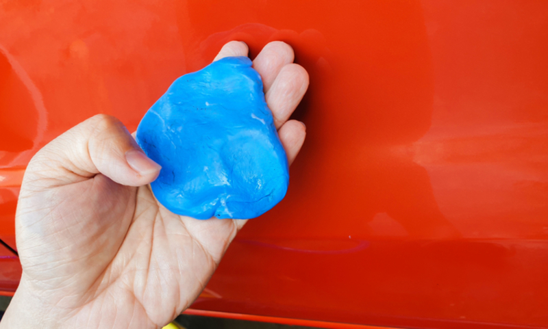 Use a Clay Bar to Remove Stubborn Grease Stains | Shutterstock