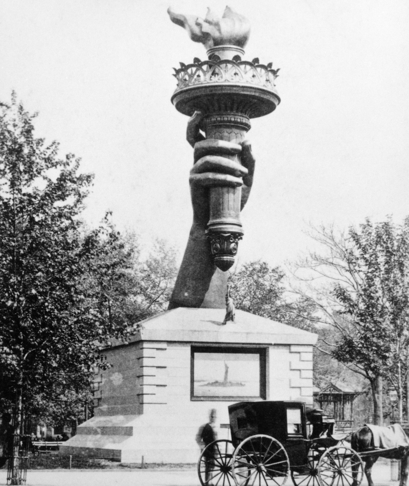 The Arm and Torch of the Statue of Liberty | Alamy Stock Photo by ClassicStock /H. ARMSTRONG ROBERTS