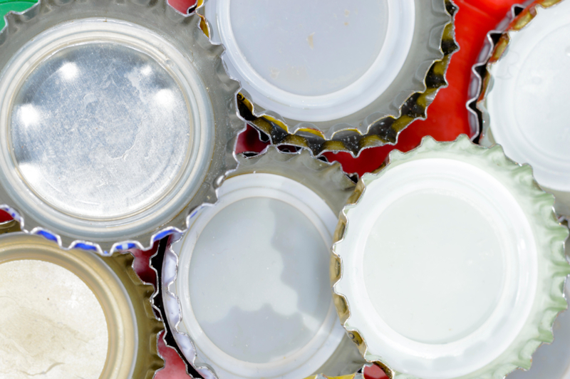 Discs Under Bottle Caps | Alamy Stock Photo