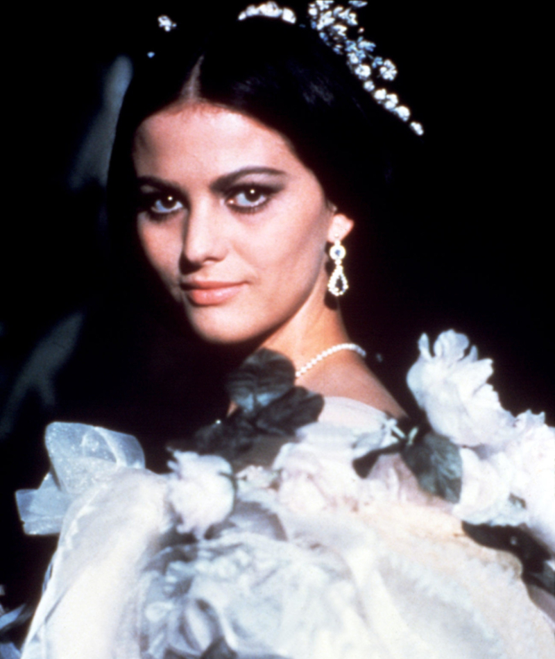 Italian Film Star Claudia Cardinale Looking off into the Distance During an Event in 1963 | Alamy Stock Photo